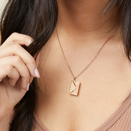 Secret envelope necklace with a hidden love message 